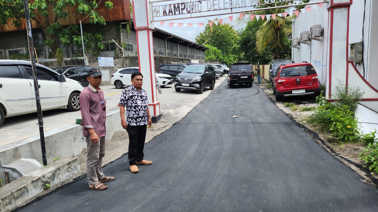 PEMBANGUNAN JALAN DI DLEGAN